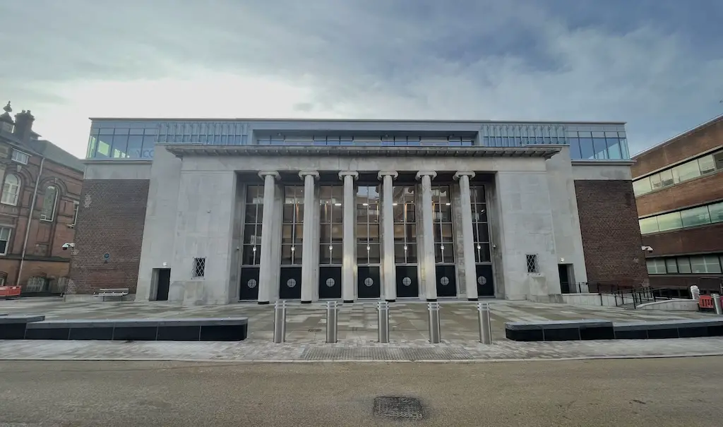 Wolverhampton Civic Hall, a popular venue for concerts, comedy shows, and other events, is shown in a recent photo. The building features a modern facade with a row of six columns and a prominent entrance.
