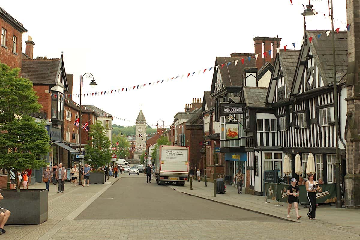 high street in leek with tudor buildings and old brick buildings along the sides