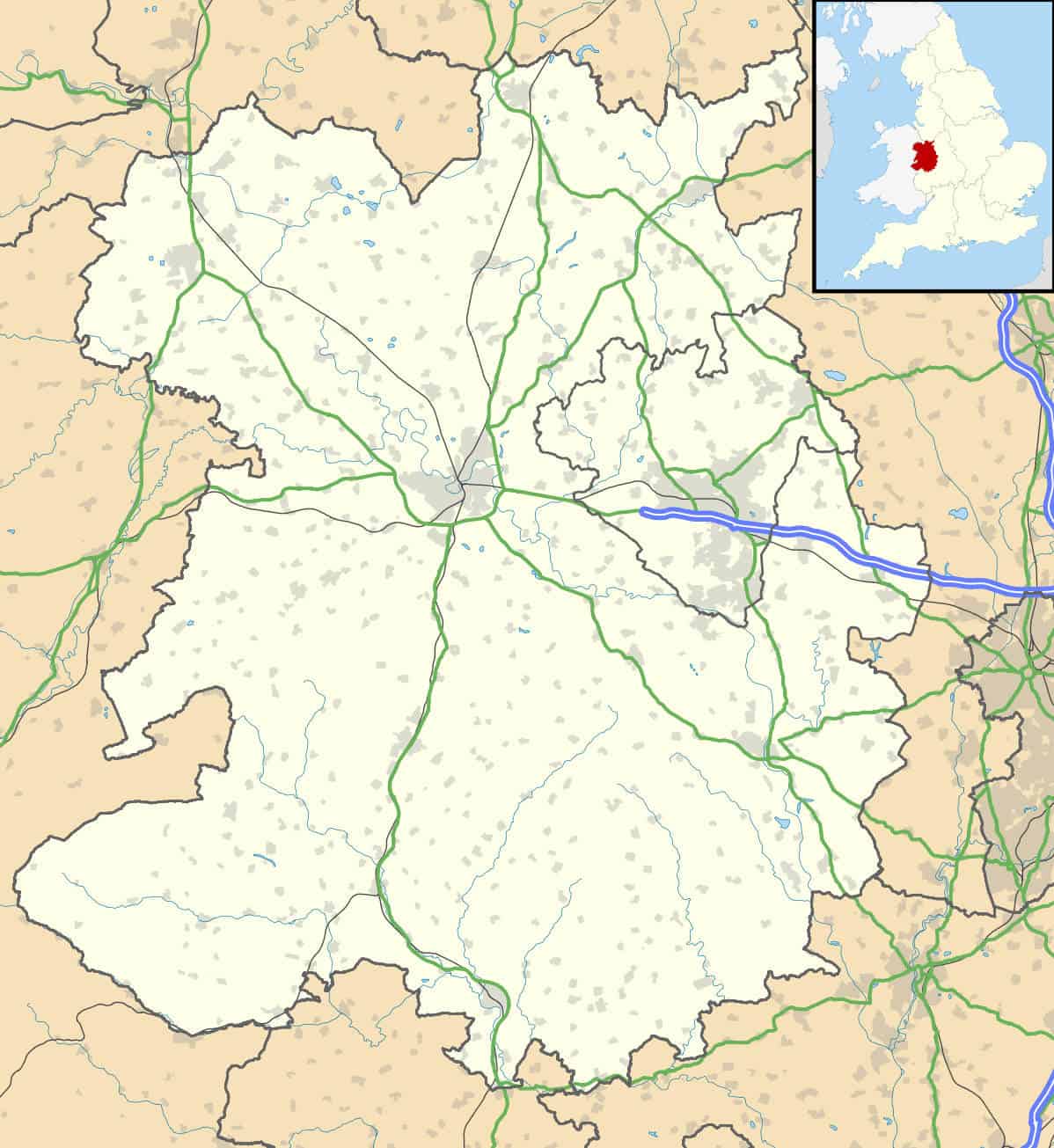 outline of shropshire county on the west midlands with main road routes in green, other roads in grey, rivers, urban areas highlighted in grey, and a small map of the UK with red highlighted county of shropshire in the top right corner.